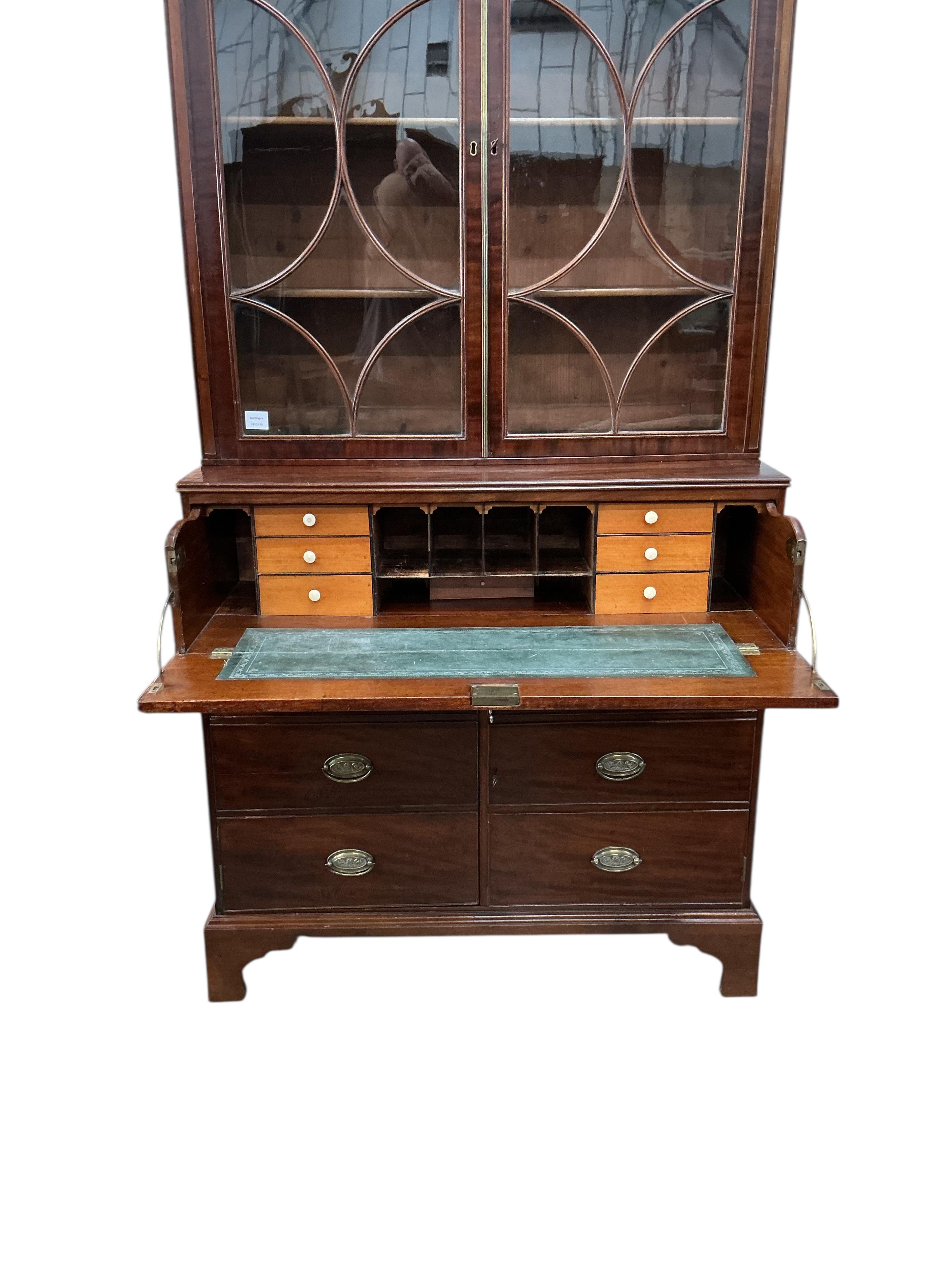 A George III mahogany secretaire bookcase with dummy drawer front, width 116cm, depth 37cm, height 212cm CITES Submission reference 514NUNMK